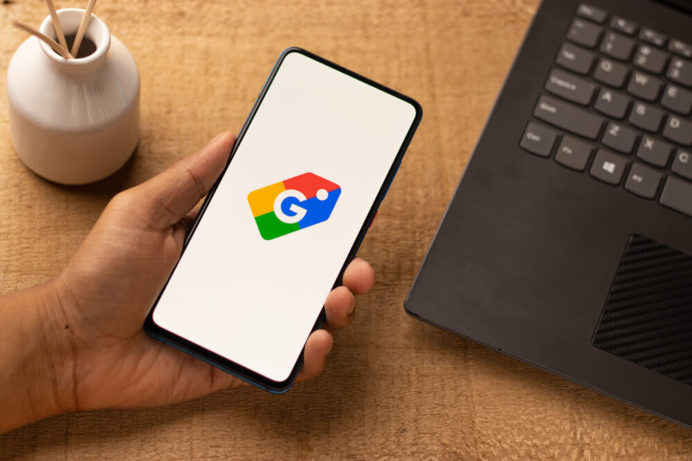 Google Shopping logo on phone screen